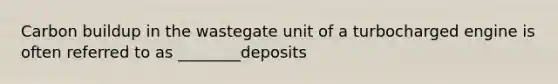 Carbon buildup in the wastegate unit of a turbocharged engine is often referred to as ________deposits