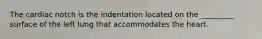 The cardiac notch is the indentation located on the _________ surface of the left lung that accommodates the heart.