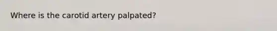 Where is the carotid artery palpated?