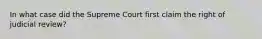 In what case did the Supreme Court first claim the right of judicial review?