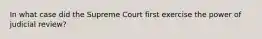 In what case did the Supreme Court first exercise the power of judicial review?