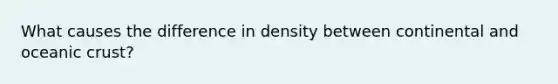 What causes the difference in density between continental and oceanic crust?