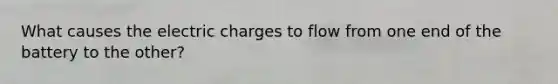 What causes the electric charges to flow from one end of the battery to the other?