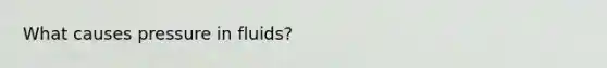 What causes pressure in fluids?