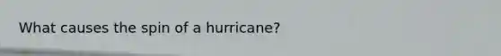 What causes the spin of a hurricane?