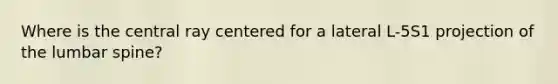 Where is the central ray centered for a lateral L-5S1 projection of the lumbar spine?