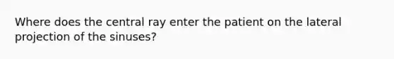 Where does the central ray enter the patient on the lateral projection of the sinuses?