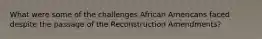 What were some of the challenges African Americans faced despite the passage of the Reconstruction Amendments?