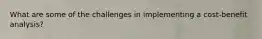 What are some of the challenges in implementing a cost-benefit analysis?