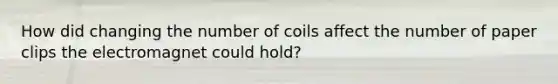 How did changing the number of coils affect the number of paper clips the electromagnet could hold?