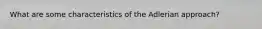 What are some characteristics of the Adlerian approach?