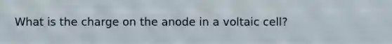 What is the charge on the anode in a voltaic cell?