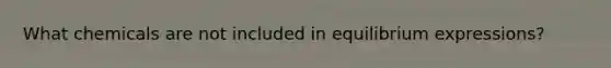 What chemicals are not included in equilibrium expressions?