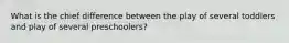 What is the chief difference between the play of several toddlers and play of several preschoolers?