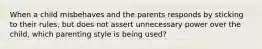 When a child misbehaves and the parents responds by sticking to their rules, but does not assert unnecessary power over the child, which parenting style is being used?