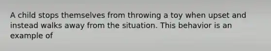 A child stops themselves from throwing a toy when upset and instead walks away from the situation. This behavior is an example of