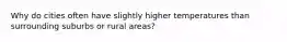 Why do cities often have slightly higher temperatures than surrounding suburbs or rural areas?