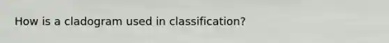 How is a cladogram used in classification?