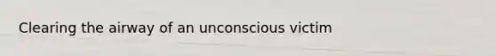 Clearing the airway of an unconscious victim