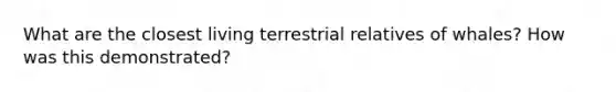 What are the closest living terrestrial relatives of whales? How was this demonstrated?