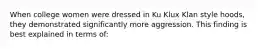 When college women were dressed in Ku Klux Klan style hoods, they demonstrated significantly more aggression. This finding is best explained in terms of: