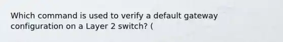 Which command is used to verify a default gateway configuration on a Layer 2 switch? (