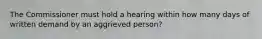 The Commissioner must hold a hearing within how many days of written demand by an aggrieved person?