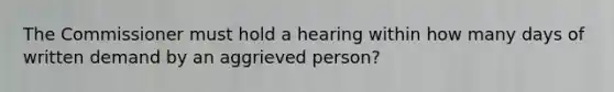 The Commissioner must hold a hearing within how many days of written demand by an aggrieved person?