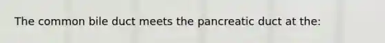 The common bile duct meets the pancreatic duct at the: