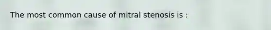 The most common cause of mitral stenosis is :