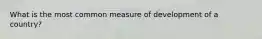 What is the most common measure of development of a country?