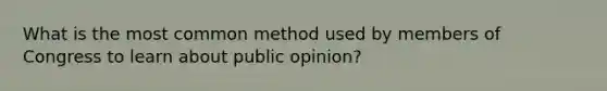 What is the most common method used by members of Congress to learn about public opinion?