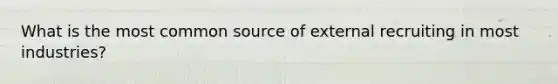 What is the most common source of external recruiting in most industries?