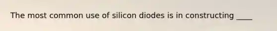 The most common use of silicon diodes is in constructing ____