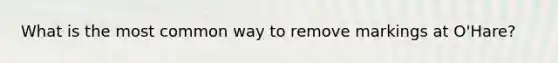 What is the most common way to remove markings at O'Hare?