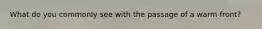 What do you commonly see with the passage of a warm front?