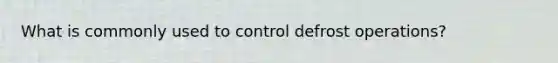 What is commonly used to control defrost operations?