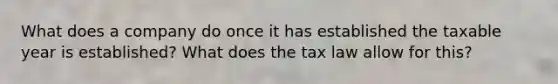 What does a company do once it has established the taxable year is established? What does the tax law allow for this?