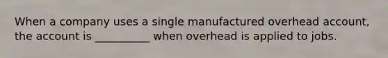 When a company uses a single manufactured overhead account, the account is __________ when overhead is applied to jobs.