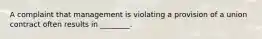 A complaint that management is violating a provision of a union contract often results in ________.