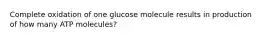 Complete oxidation of one glucose molecule results in production of how many ATP molecules?