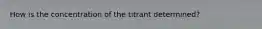 How is the concentration of the titrant determined?