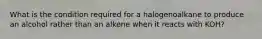 What is the condition required for a halogenoalkane to produce an alcohol rather than an alkene when it reacts with KOH?