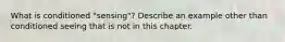 What is conditioned "sensing"? Describe an example other than conditioned seeing that is not in this chapter.