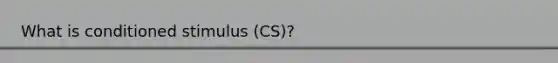 What is conditioned stimulus (CS)?