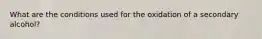 What are the conditions used for the oxidation of a secondary alcohol?