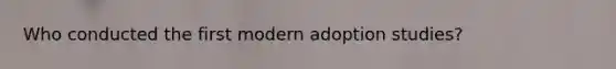 Who conducted the first modern adoption studies?