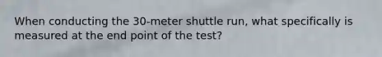 When conducting the 30-meter shuttle run, what specifically is measured at the end point of the test?