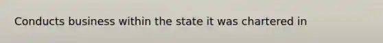 Conducts business within the state it was chartered in