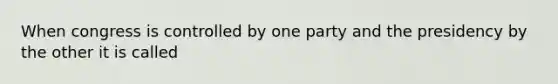 When congress is controlled by one party and the presidency by the other it is called